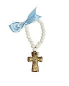 Necklace with white blessing beads and a gold cross pendant