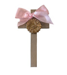 Decorative wooden plaque with a gold leaf emblem with a stork and pink ribbon 