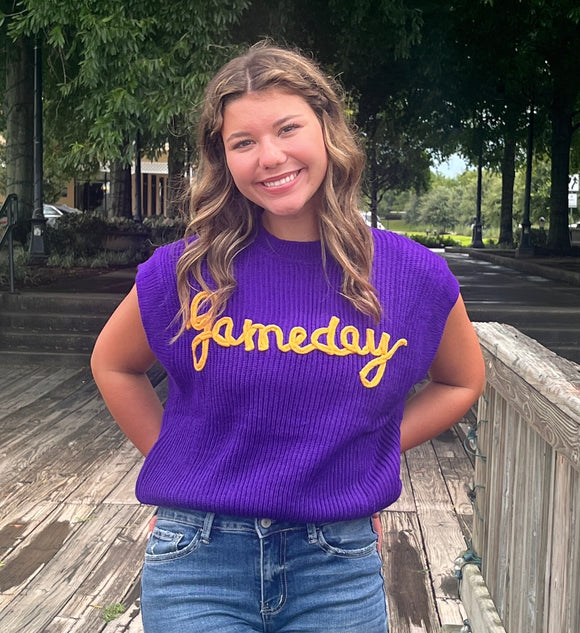Purple sleeveless sweater with 'GameDay' in yellow text