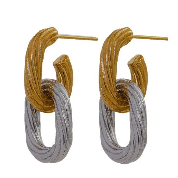 Pair of gold and silver interlocking hoop earrings 