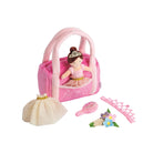 Pink toy purse with a doll, brush, comb, and accessories 
