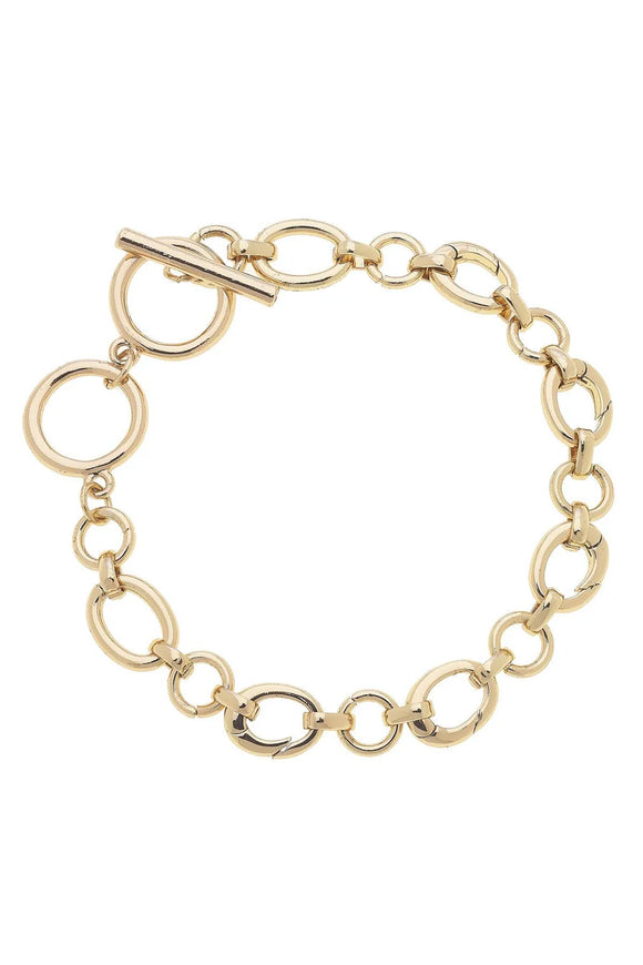 Gold chain charm bracelet with a toggle clasp 