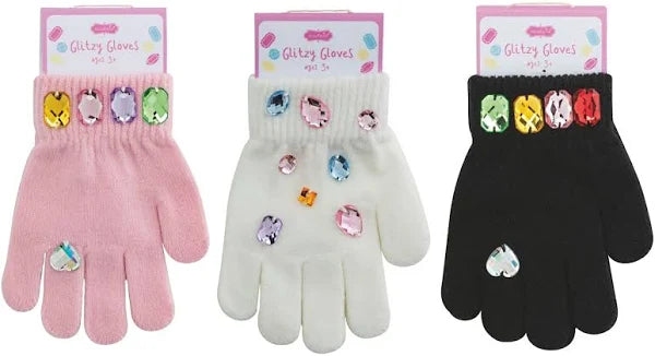 Three pairs of glittery gloves in pink, white, and black with colorful gems.
