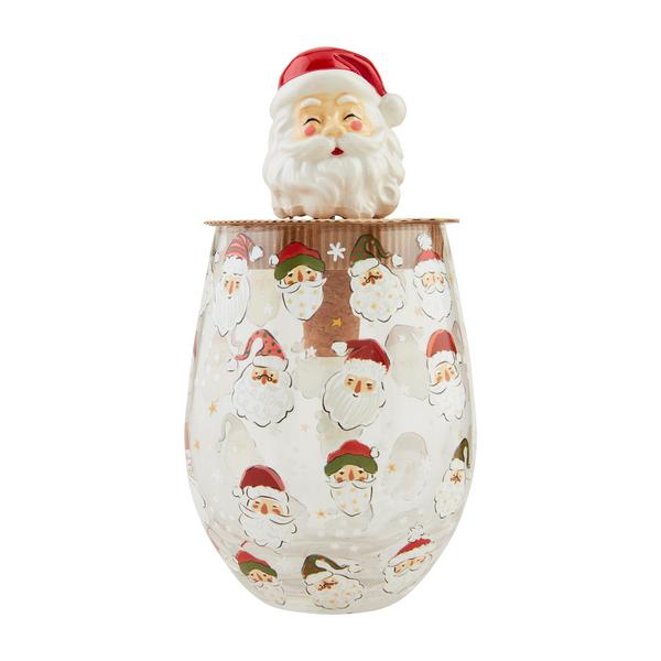 Decorative wine glass with Santa Claus design and Santa figurine on top