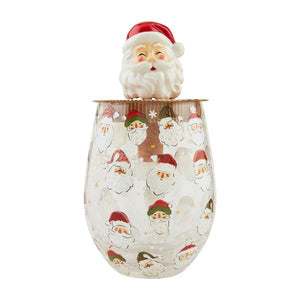 Decorative wine glass with Santa Claus design and Santa figurine on top